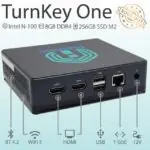 Pulcro TurnKey One Mini PC with Intel N-100, 8GB DDR4 RAM, 256GB SSD, and rear connectivity options including HDMI, USB, LAN, and DC input.