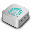 Pulcro TurnKey QBE Mini PC with compact cube design and triple USB ports.